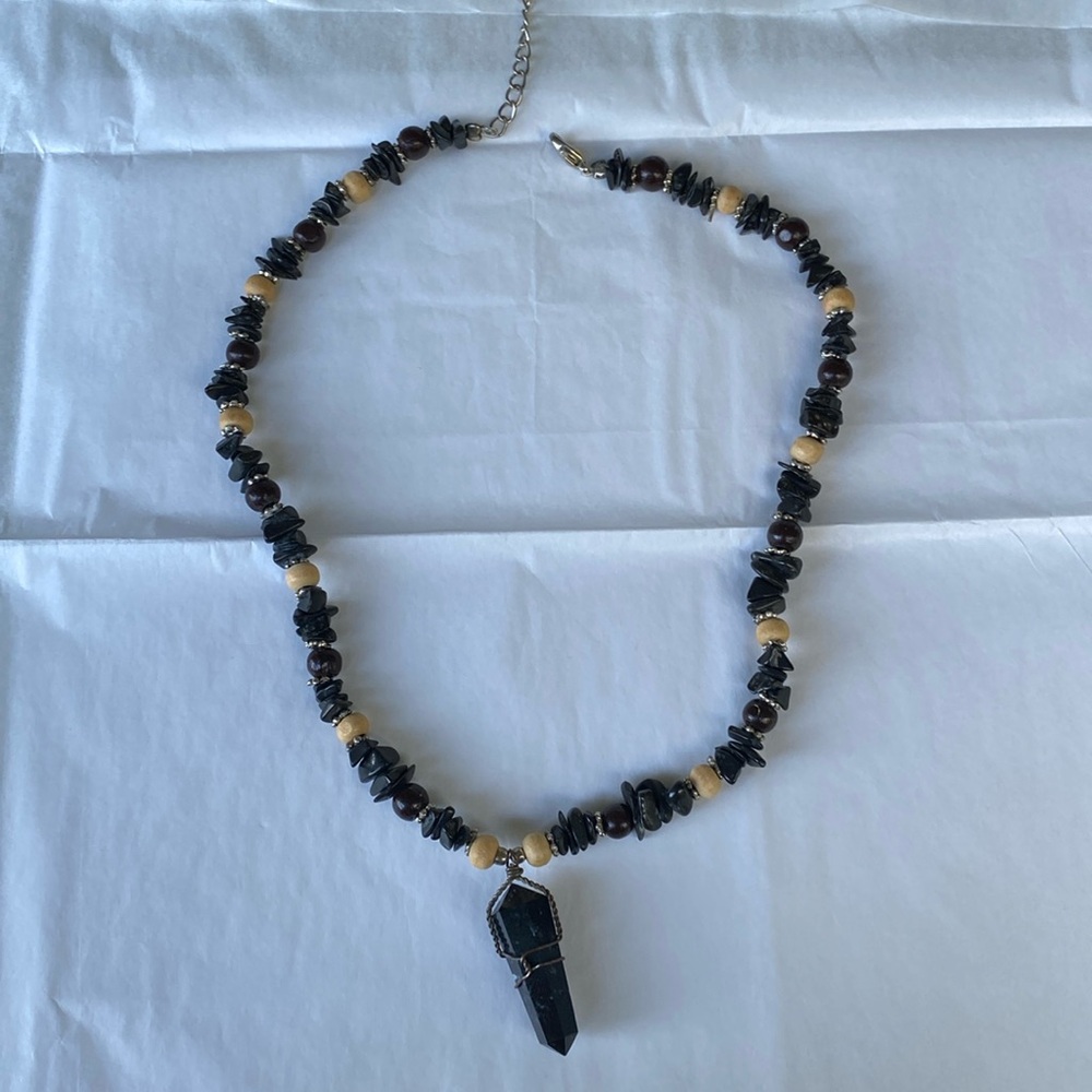 Black stone beaded necklace with beautiful black big expensive crystal stone